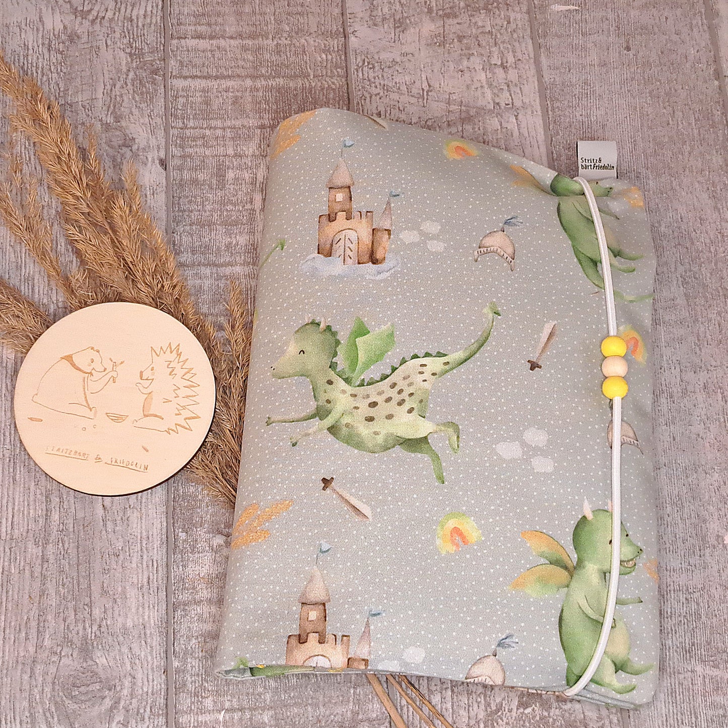 Windeltasche, Wickeltasche, Windeln, Feuchttücher, Organizer, kleiner Drache, gelbe Perlen, Gummiband,